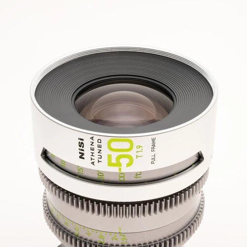 Front view of the NiSi ATHENA 50mm lens displaying lens elements and aperture markings.